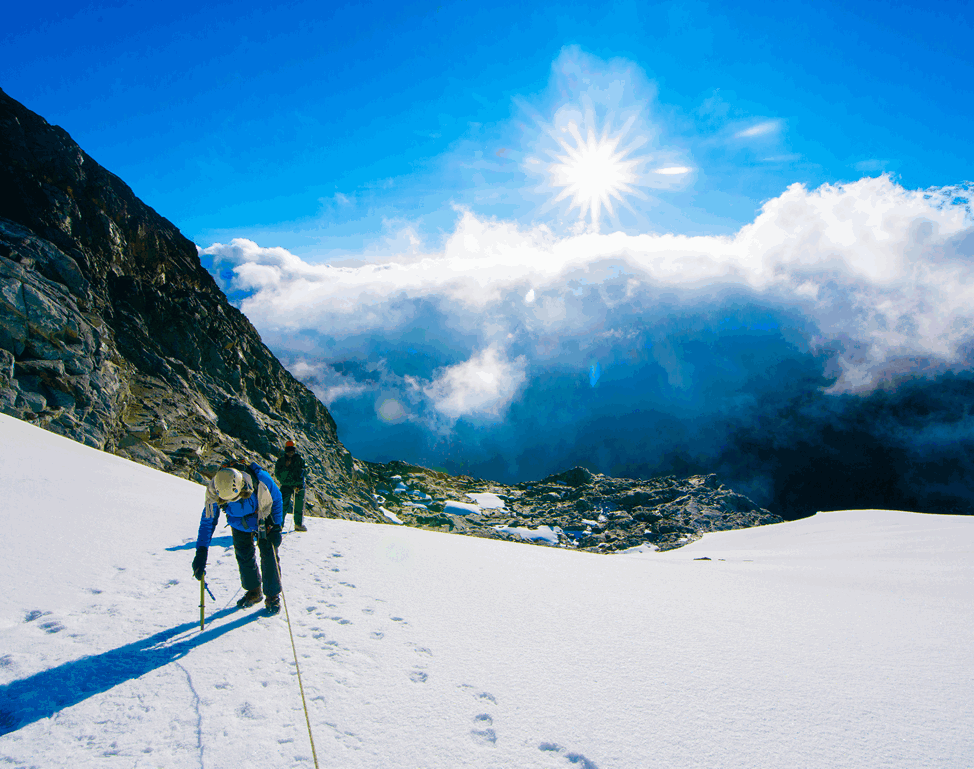 Rwenzori hike: A climber on the Stanley glacier in the Rwenzori Mountains in Uganda - Nandi Adventures