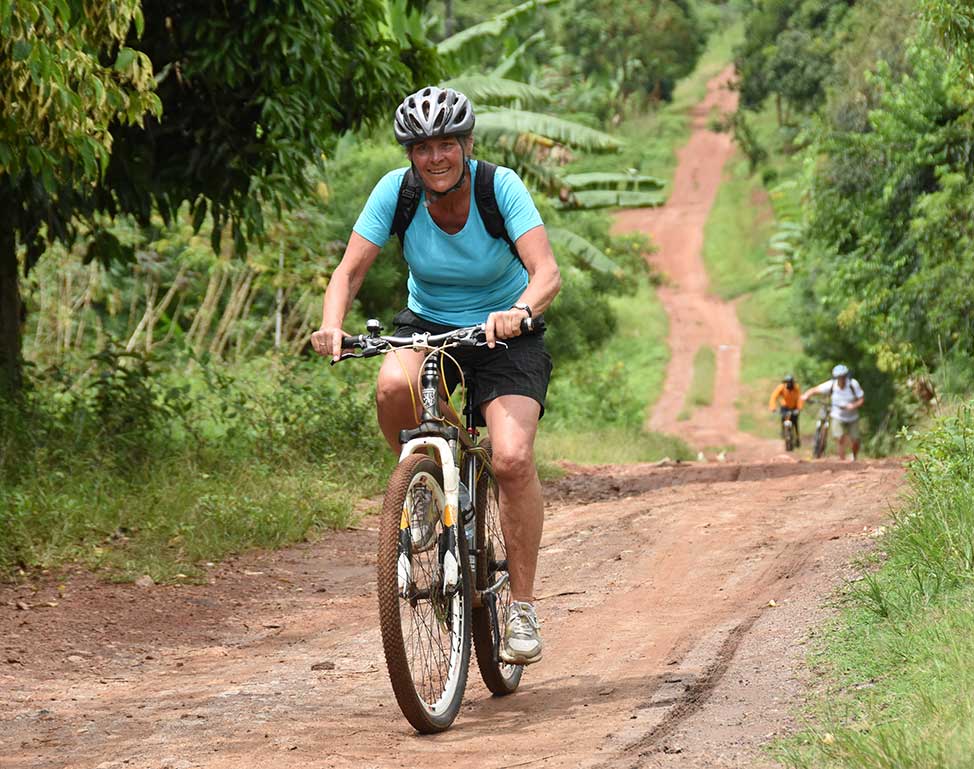 Biking along village paths near Lake Victoria in Uganda - Nandi Adventures